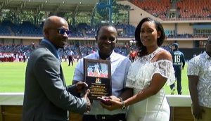 Devon Smith receives plaque 