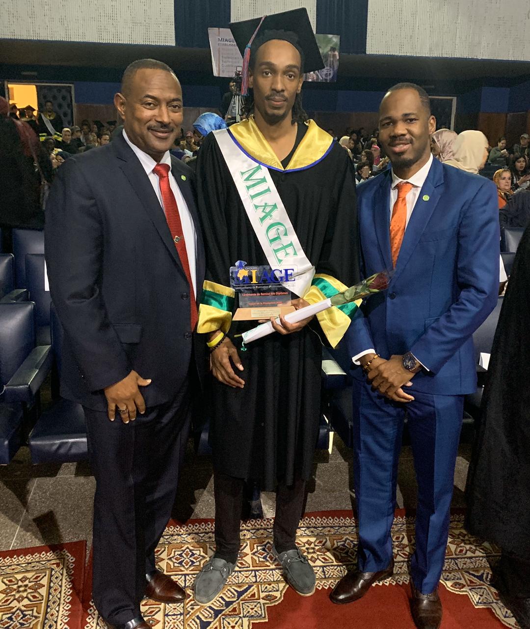 [L-R] His Excellency Ian M. Queeley, Ambassador-Designate to the Embassies of Eastern Caribbean States to the Kingdom of Morocco; Graduate Mr. Terry Gregory Lovell of the Commonwealth of Dominica; and Mr. Kurt Williams, First Secretary to the Embassies of Eastern Caribbean States to the Kingdom of Morocco, in attendance at Mr. Lovell’s graduation ceremony