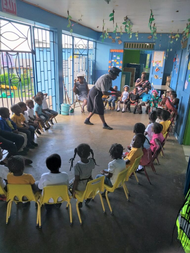 Officer Jacobs interacting with children at daycare in Sandy Point