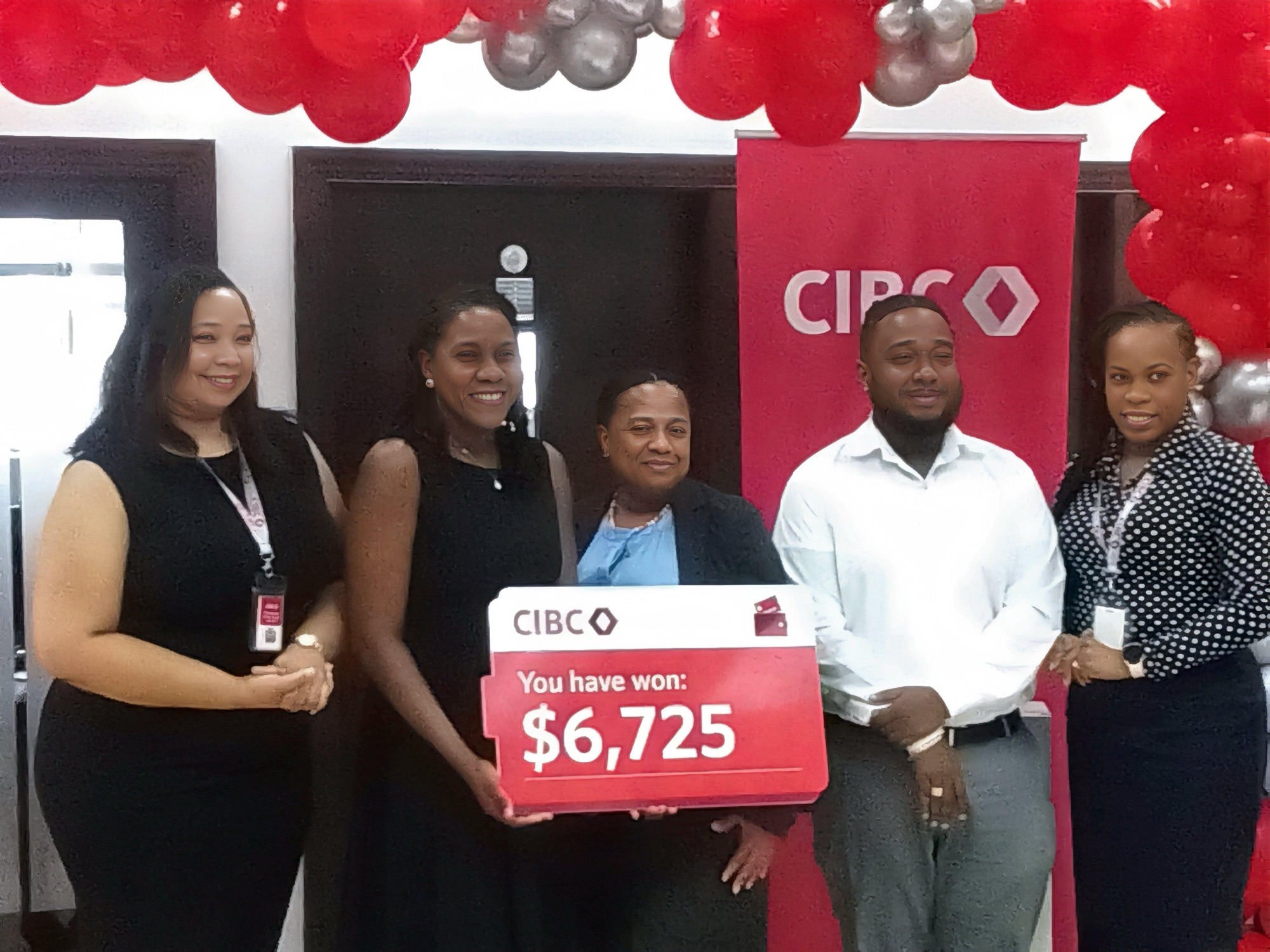 CIBC CARIBBEAN CUSTOMER WINS CASH AND OTHER PRIZES